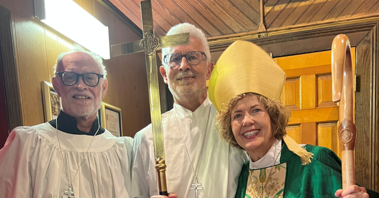 Bishop Ruth Woodliff-Stanley with Tommy and Eric Bultman, servers, at Good Shepherd, Sumter visitation on June 7, 2026