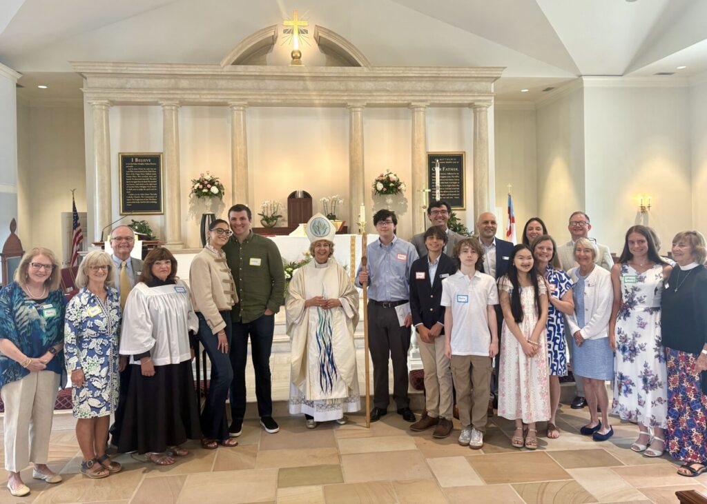 Bishop Ruth Woodliff-Stanley stands with confirmands at visitation to Christ Episcopal Church in Mt Pleasant South Carolina