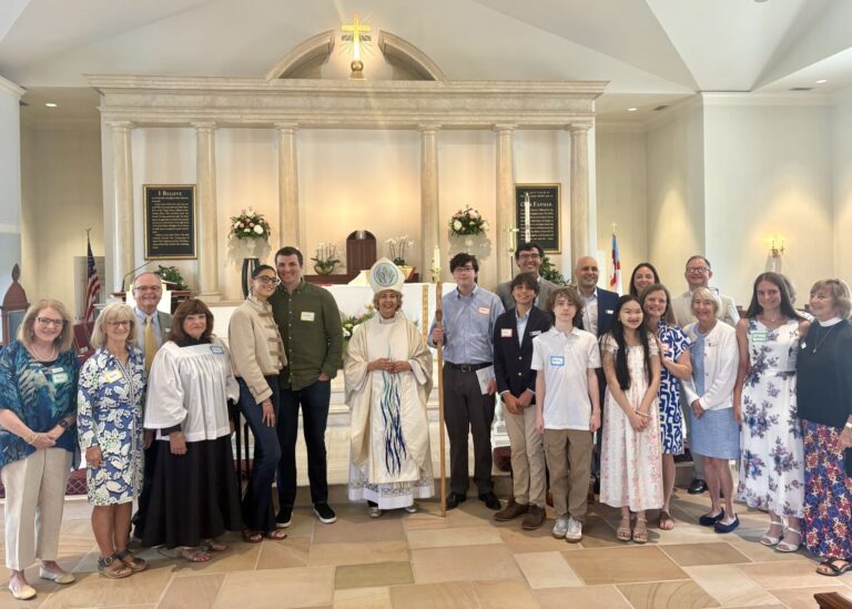 Bishop Ruth Woodliff-Stanley stands with confirmands at visitation to Christ Episcopal Church in Mt Pleasant South Carolina